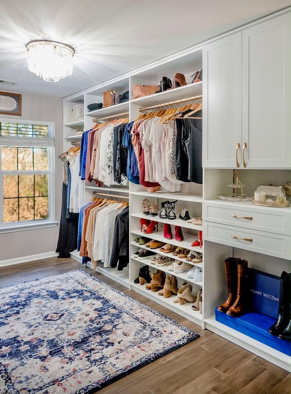 White walk-in closet with boot storage
